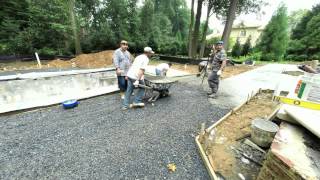 Concrete slab installation for Travertine pool deck.