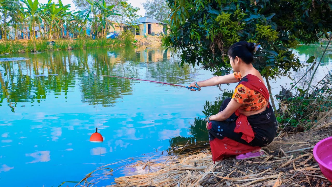 Fishing video || The cute lady is fishing with hook in the beautiful nature pond || Hook fishing