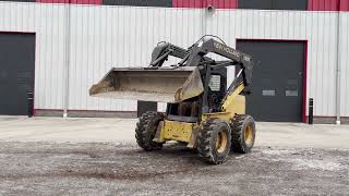 1999 New Holland LX985 Skid Loader