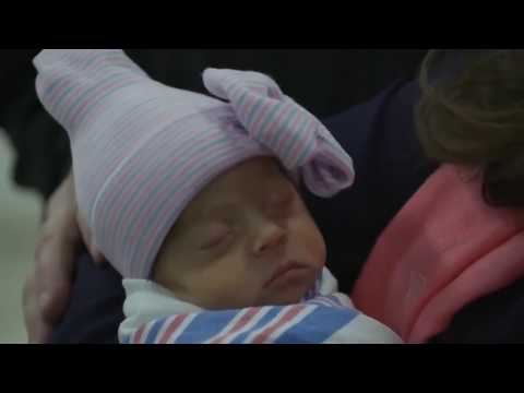 N.Y. mother meets her daughter after emergency C-section