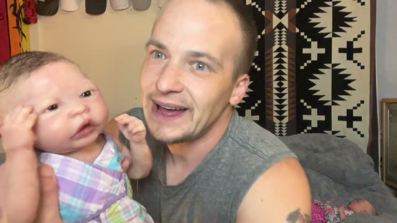 Full body silicone babies hanging out with daddy for some cuddle time and new outfits of the day