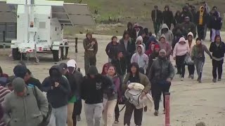 Group of migrants seen crossing US border in San Diego County
