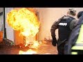 CRAZY SUSPECT ANSWERS THE DOOR WITH A FLAME THROWER!