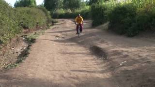 A Boy Is Riding A Bike From Kurro Haro To Haramaya School