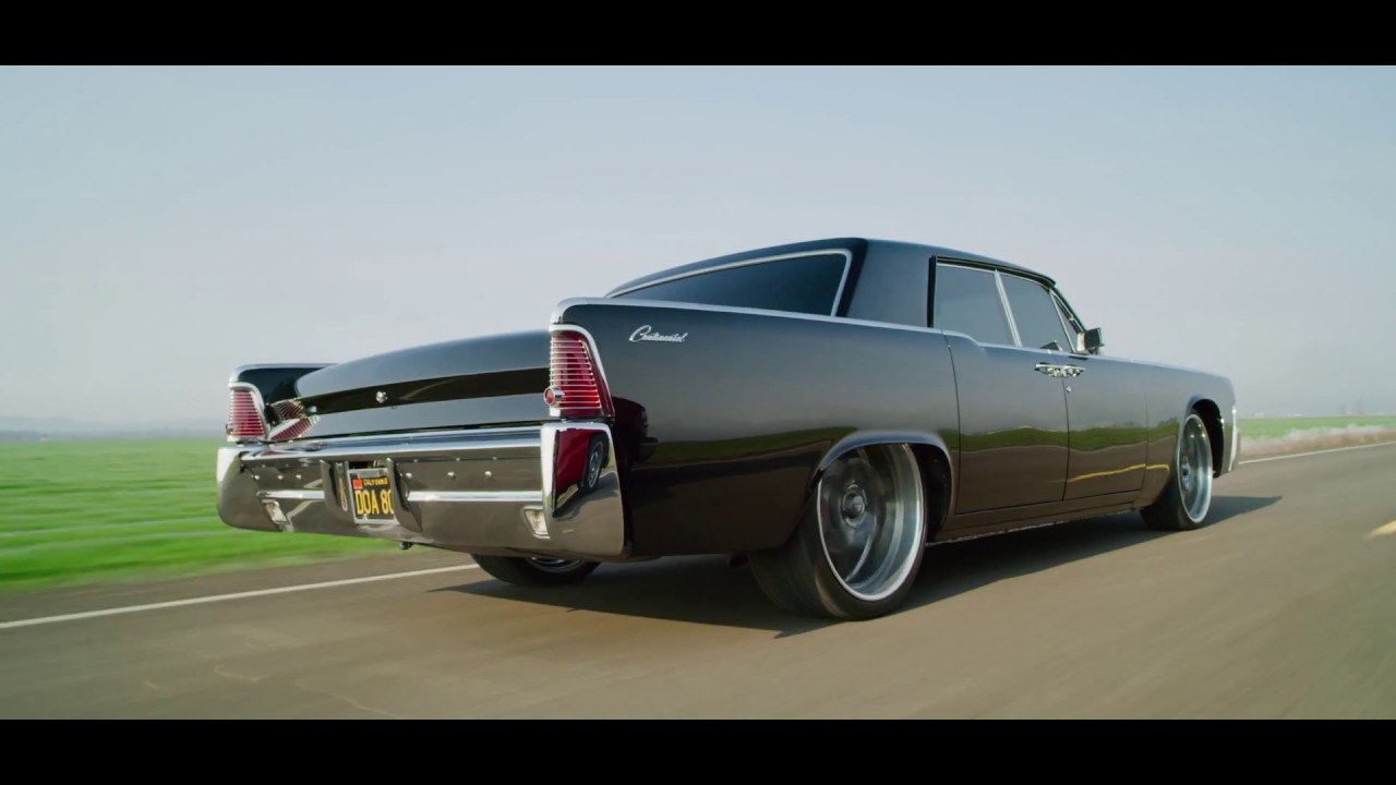 Metalworks black 1965 Lincoln Continental build. Bagged on Rushforth