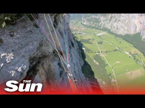 Paraglider smashes into cliff wall before getting up and walking 5km to hospital