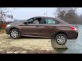 During a simulated reversing maneuver, both rear wheels accidentally fell off a curb.