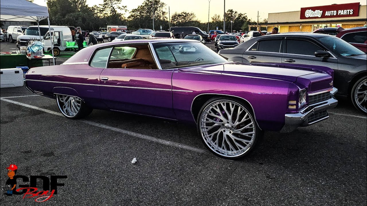 Purple 1972 Donk on Brushed Face Savini Wheels.