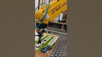 FANUC LR Mate 200iD Robot Pushing cars May 2024