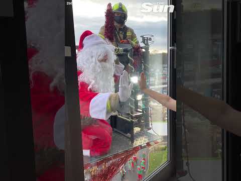 Santa swaps sleigh for CRANE to visit children in hospital #Shorts 🎅🏼 🎄