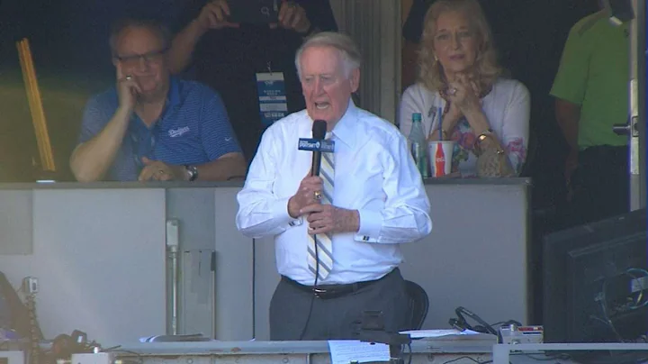 Scully addresses the crowd at Dodger Stadium