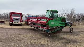 SOLD CCIL 550 swather Ronald Farms May 1st Lot 2160