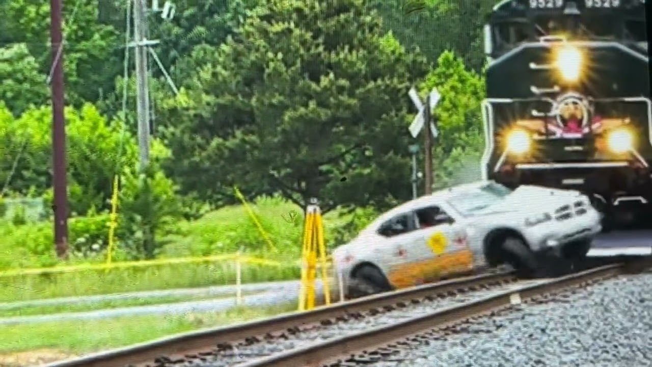 A regal sports car got hit by a train green #27￼