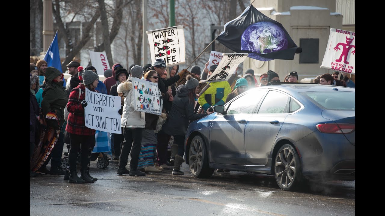 Man who drove car through crowd at protest will not be charged, says