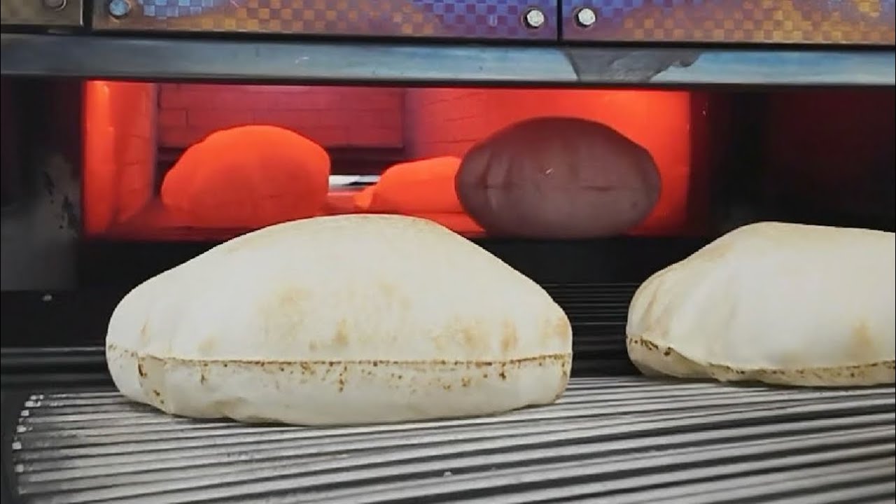 Fully automatic Arabic/Lebanese pita bread production lines.Arabic pita flatbread machines