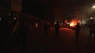 New York protesters set fires, clash with police