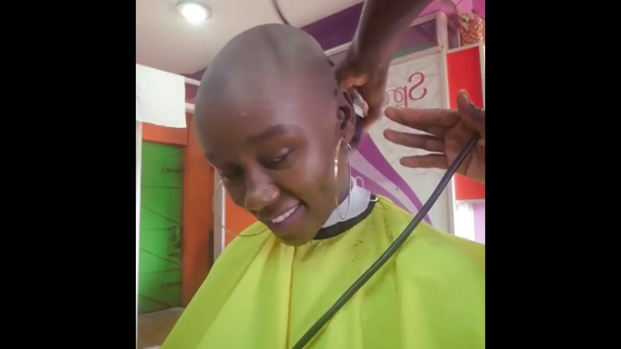 Kenyan girl goes to the barber for a perfect smooth head! - YouTube