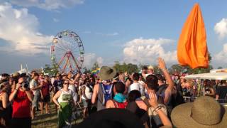 7 year old breaks Guinness World Record for most high fives in an hour at Bonnaroo Music Festival