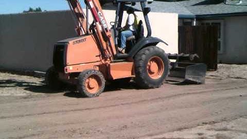Gannon skills on a Skip Loader Grader