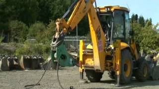 Backhoe mechanical coupler Attach & Release.wmv