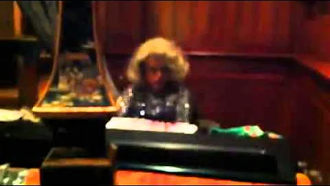 Veronica Devore aka Patrick Anderson at the piano