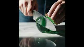 Slicing an emerald apple #satisfying #asmr #asmrsounds #asmrvideo #ai #veo3