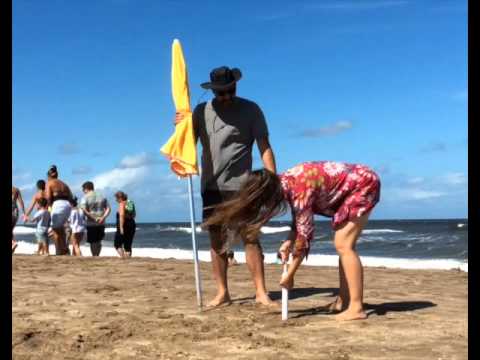 An Ez Sand Er Anchors Umbrella On A Windy Beach In Argentina An Ez Sand Er Anchors Umbrella On A Windy Beach In Argentina