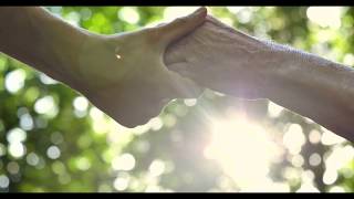 Videoblocks The Hand Of A Young Girl Woman Holds The Hand Of An Elderly Person A Sign Of Love Help F