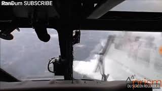 Helicopter tries landing on ship in rough sea. Pretty awesome.