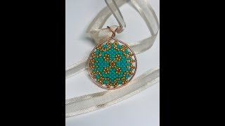 Beaded mandala motif with a wire base