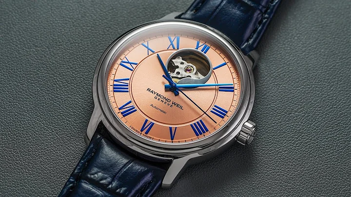 An Elegant Open Heart Dress Watch With a Salmon Di...