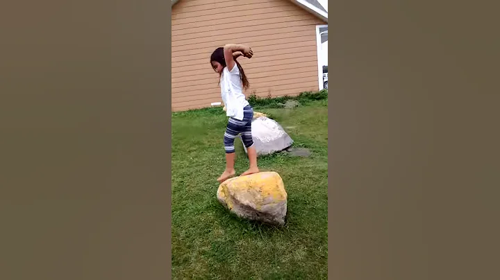Tayleigh does a front flip off of one huge Rock