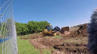 Deere 755K Digging And Stacking Dirt