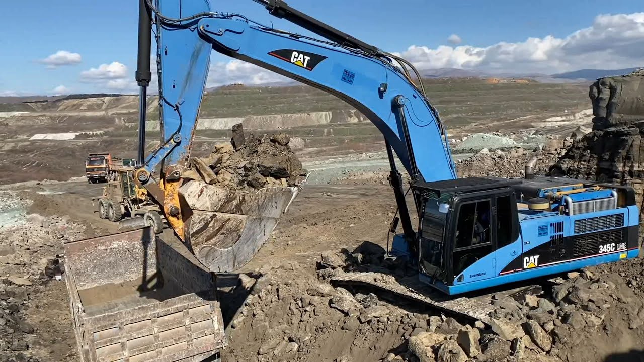 Caterpillar 345C Excavator Loading Trucks – IYDICK