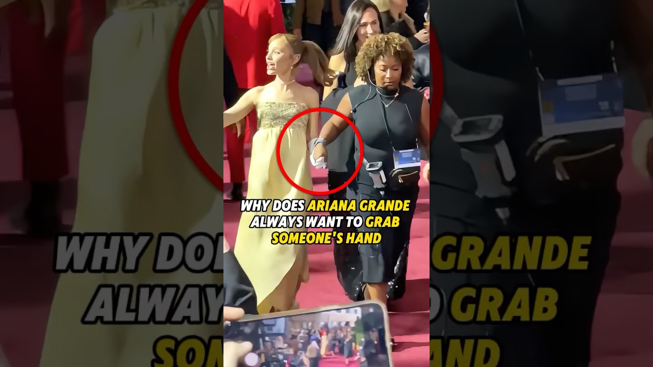 Why does Ariana Grande always want to grab someone’s hand?