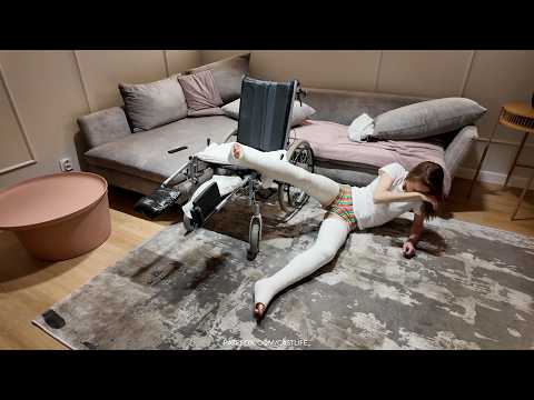 Girl in a wheelchair with both legs in long casts - she fell from the wheelchair to the ground :(