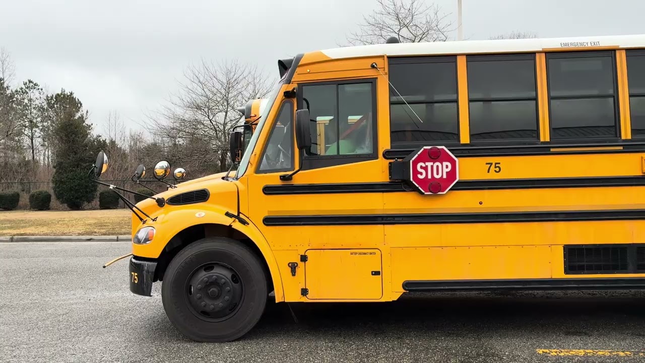 Buses leaving and entering the lot
