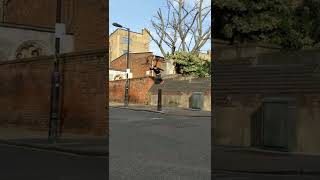Inline skater jumps from second story ledge and faceplants