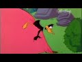 Daffy duck hose water inflation to pop