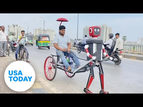 Students in India build foot taxi robot used for carrying passengers | USA TODAY