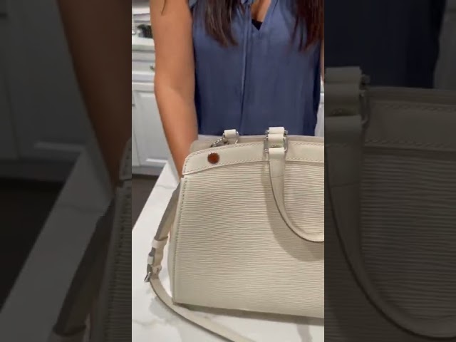 #louisvuitton Epi Brea MM in Ivory, here at One Savvy Design Consignment class=