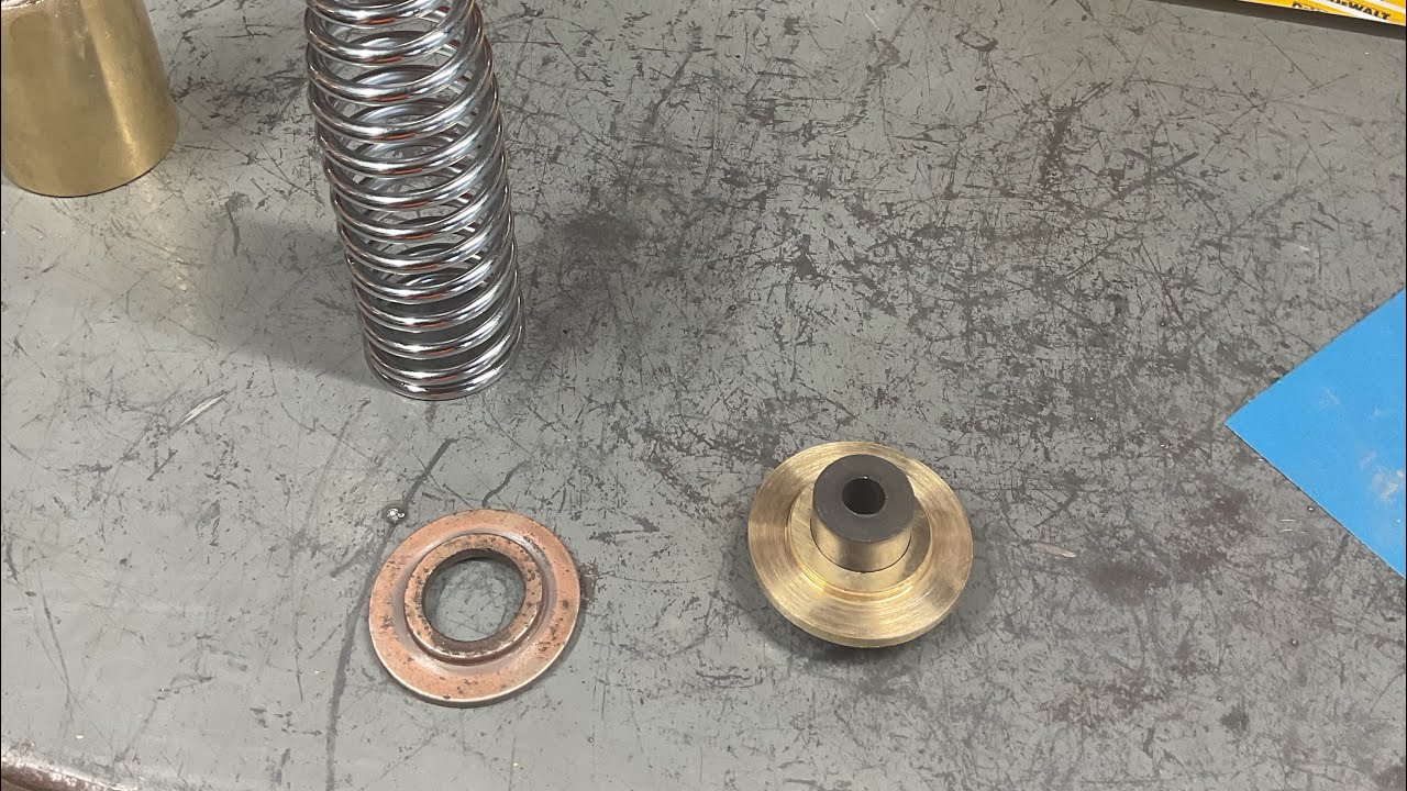 Harley cross bones rebuild fabricating brass spring cups on smithy ...
