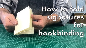 Folding a signature for a sewn book