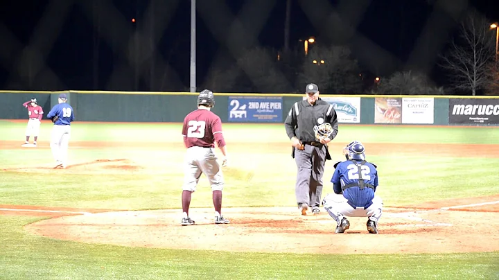Derek Slagle pitches, Travis Crammer squeezes a fl...