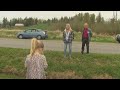 Loved ones connect across a ditch at closed US-Canada border