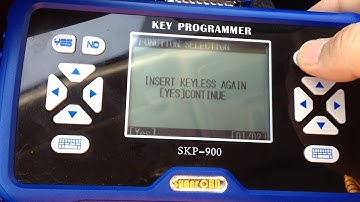 How to program a LAND ROVER FREELANDER2 Remote Key with skp900 key programmer?
