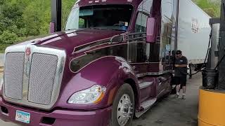 Caught in sudden rain storm at truck stop.