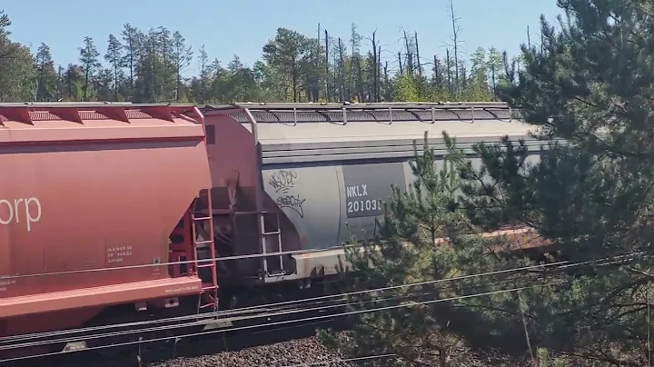 CN manifest rounds the curve at mile 98.2 Sprague sub on a nice Saturday afternoon. 9/30/2023.