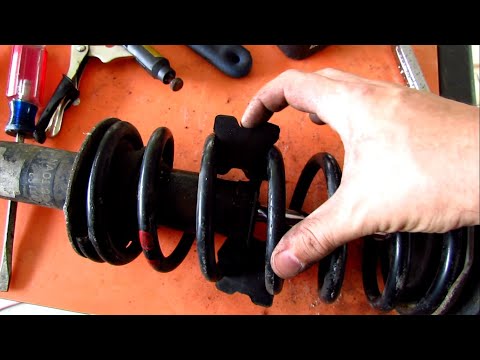 Wideo: Jak montuje się podkładki dystansowe sprężyn śrubowych?