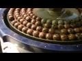 Stone bead grinding
